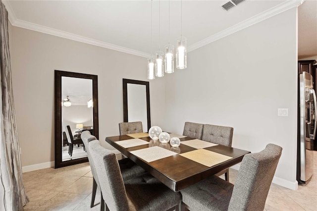 dining area featuring ceiling fan with notable chandelier, light tile patterned floors, and crown molding