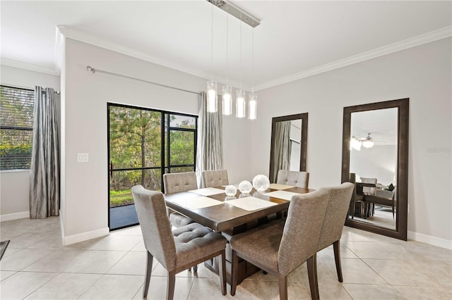 tiled dining room featuring ceiling fan and ornamental molding