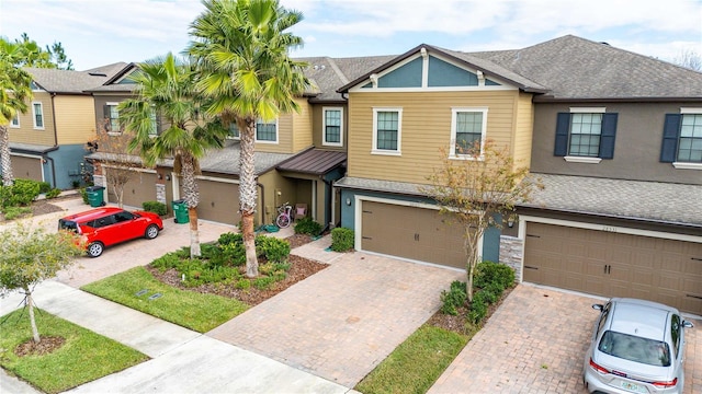 view of front of property with a garage