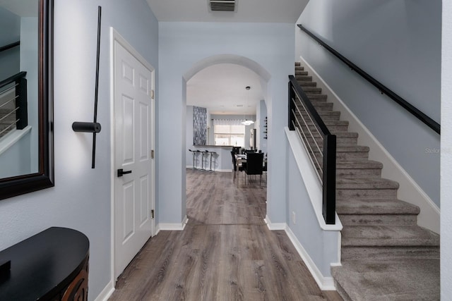 foyer featuring wood-type flooring