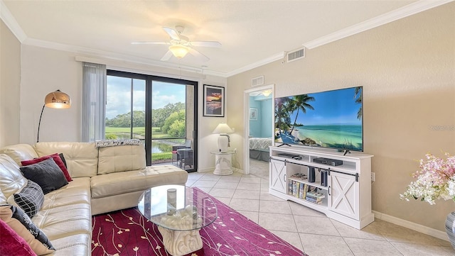 tiled living room featuring ceiling fan and ornamental molding