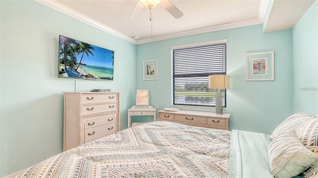 bedroom featuring ceiling fan and crown molding