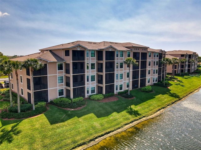 view of building exterior featuring a water view