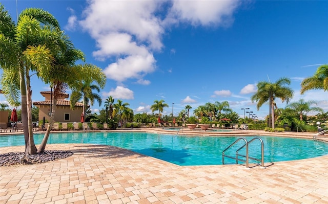 view of pool featuring a patio