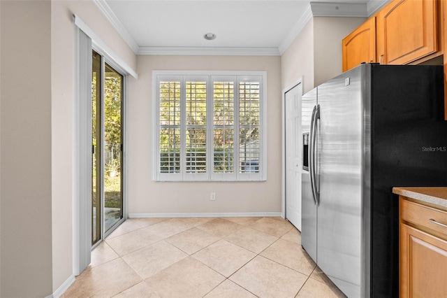 kitchen featuring light tile patterned flooring, crown molding, and stainless steel refrigerator with ice dispenser