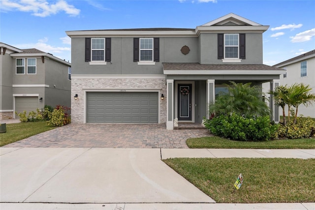 view of front of property with a garage