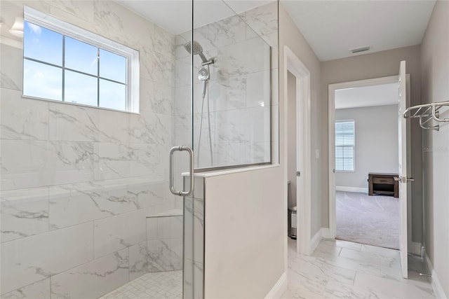 bathroom featuring walk in shower