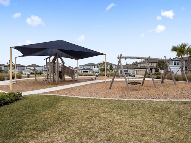 view of jungle gym with a lawn