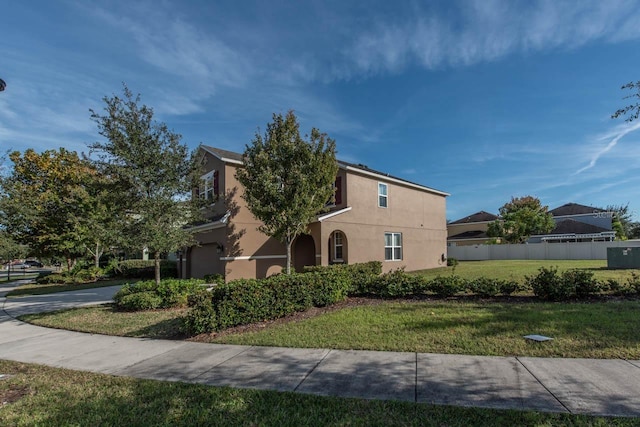 view of front of property with a front lawn