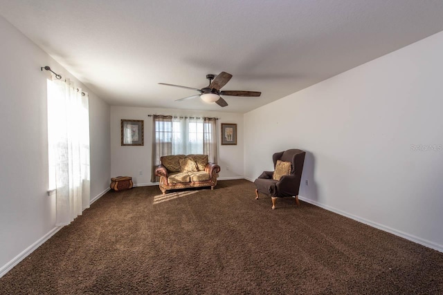 unfurnished room with ceiling fan and carpet floors