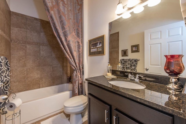 full bathroom featuring shower / bath combination with curtain, toilet, and vanity