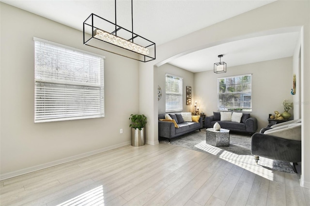 living room with light hardwood / wood-style flooring