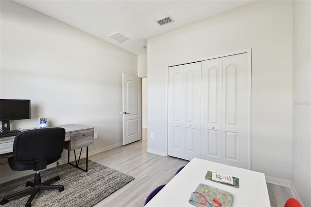 office space featuring light wood-type flooring