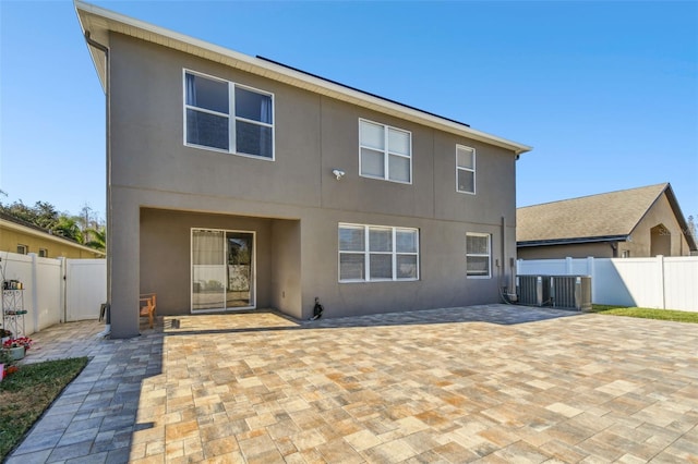 rear view of house with a patio area