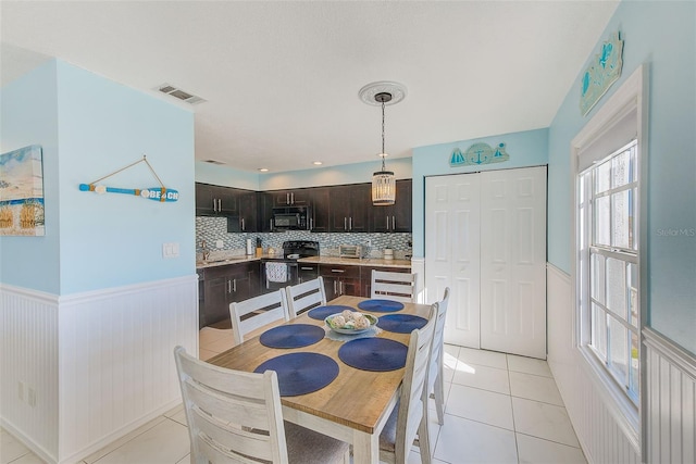 view of tiled dining area