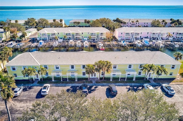 birds eye view of property featuring a water view