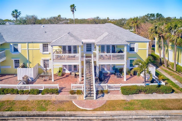 rear view of property with a patio area