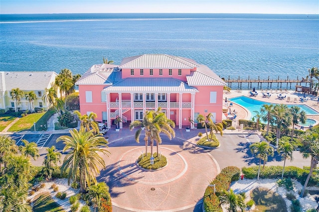 birds eye view of property featuring a water view