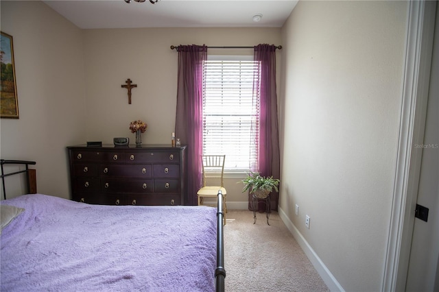 bedroom featuring carpet