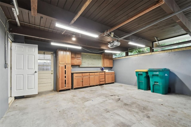 garage featuring a garage door opener