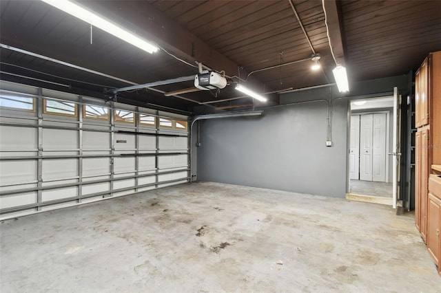 garage featuring a garage door opener