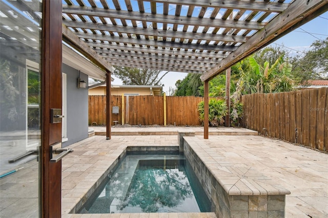 view of swimming pool featuring a pergola and a patio