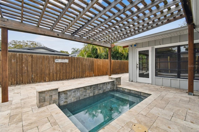 view of pool featuring a pergola, an in ground hot tub, and a patio