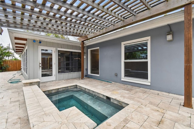 view of pool with an in ground hot tub, a pergola, and a patio