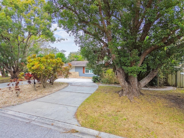 view of property hidden behind natural elements