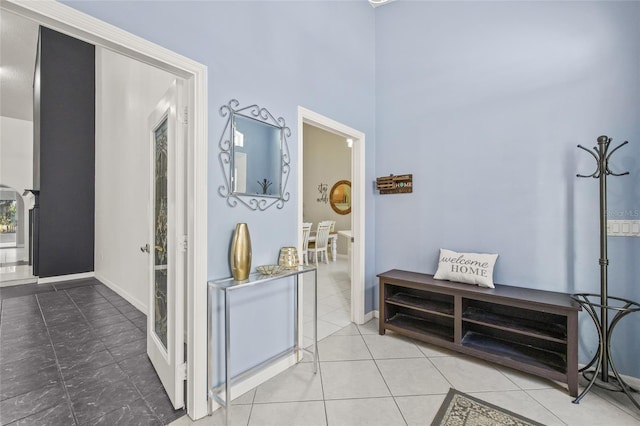 hallway featuring tile patterned floors