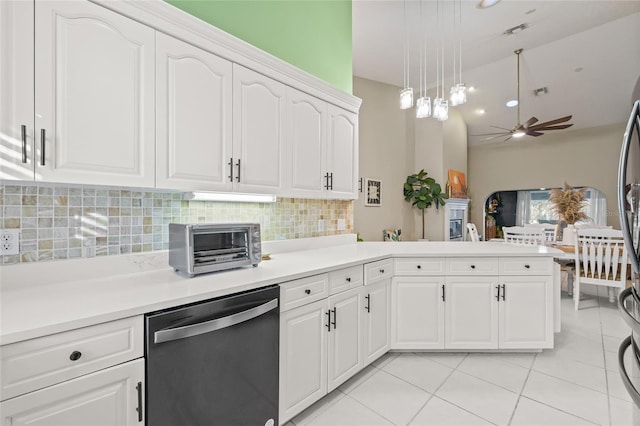 kitchen featuring dishwasher, kitchen peninsula, pendant lighting, white cabinets, and backsplash