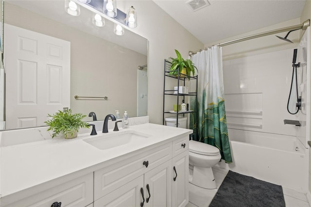 full bathroom featuring vanity, tile patterned flooring, toilet, and shower / bath combo with shower curtain