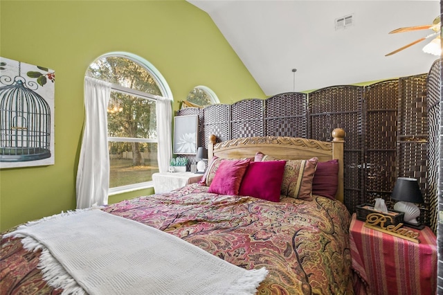 bedroom featuring lofted ceiling and ceiling fan