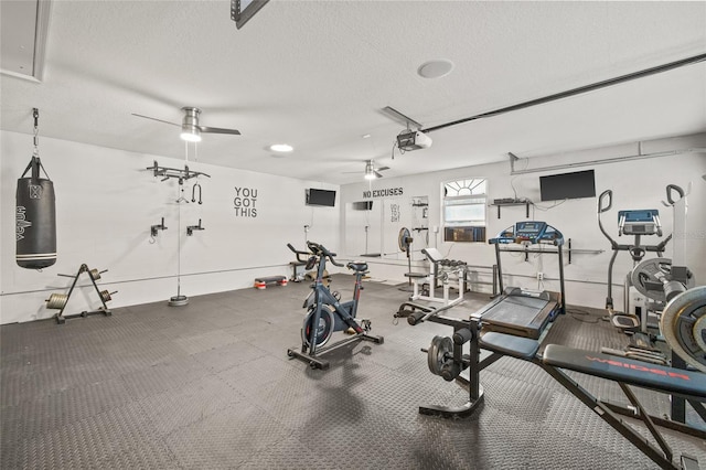 exercise room featuring ceiling fan and a textured ceiling