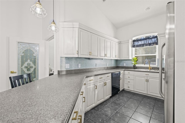 kitchen featuring dishwasher, high vaulted ceiling, sink, white cabinetry, and backsplash