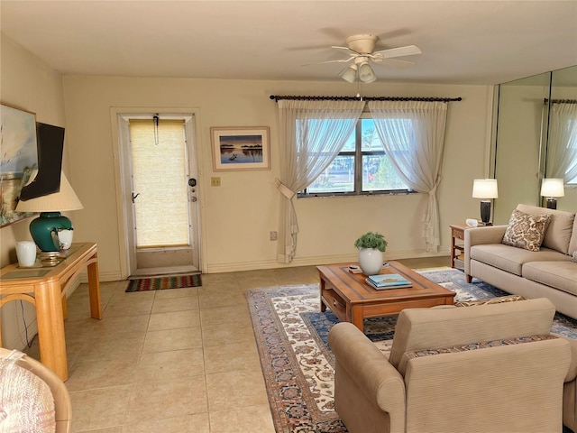 tiled living room featuring ceiling fan