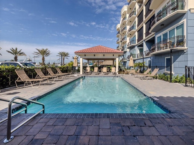 view of pool with a gazebo and a patio area