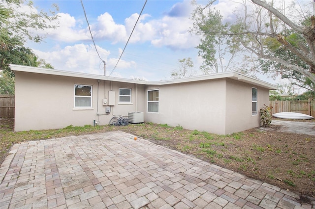 rear view of property with a patio area