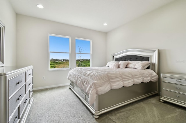 bedroom featuring dark colored carpet