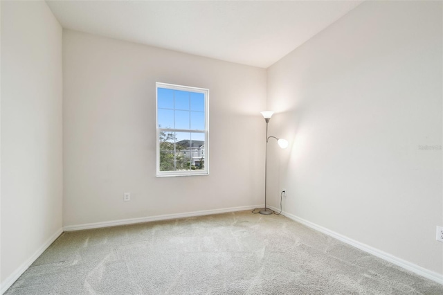 empty room with carpet flooring