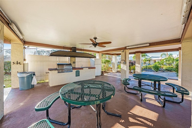 view of patio / terrace with area for grilling, ceiling fan, and a grill