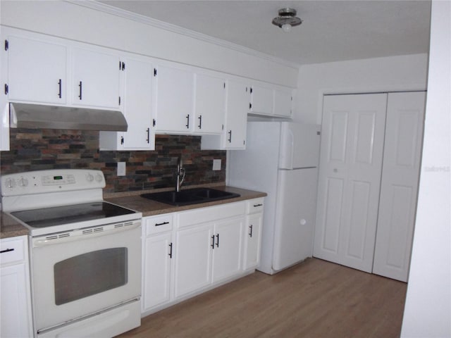 kitchen featuring decorative backsplash, light wood-type flooring, white appliances, sink, and white cabinets