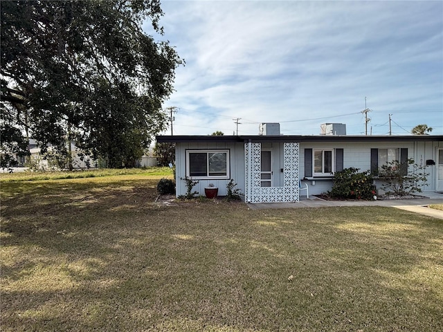 view of front of home with a front yard