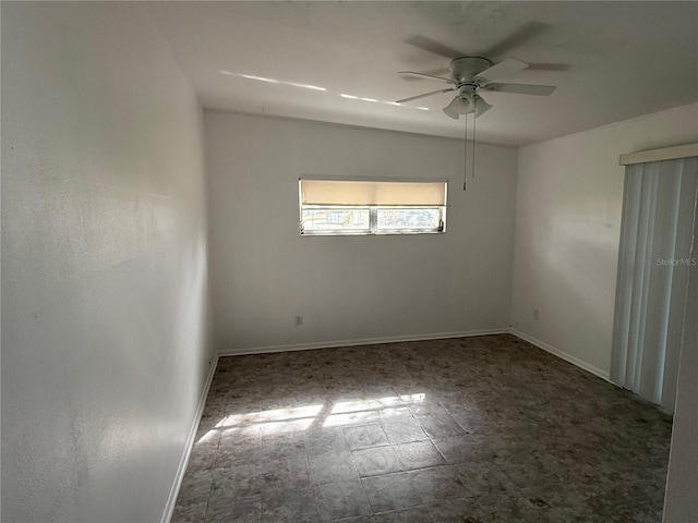 spare room with ceiling fan