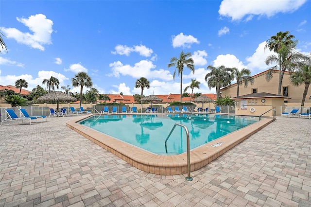 view of swimming pool with a patio