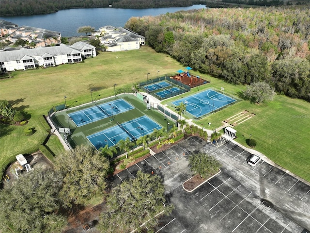 birds eye view of property featuring a water view