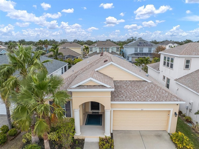 view of front of home with a garage