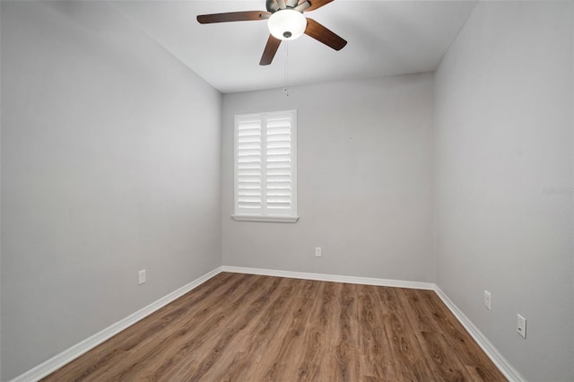 unfurnished room featuring ceiling fan and hardwood / wood-style flooring