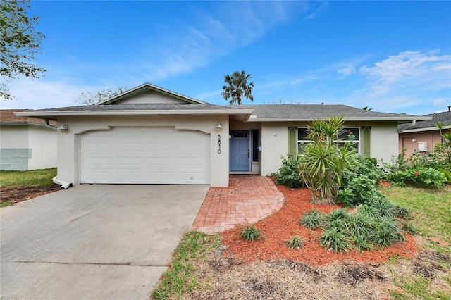 single story home with a garage