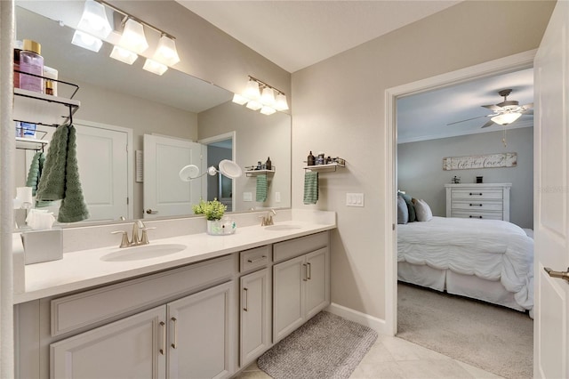 bathroom featuring ceiling fan and vanity